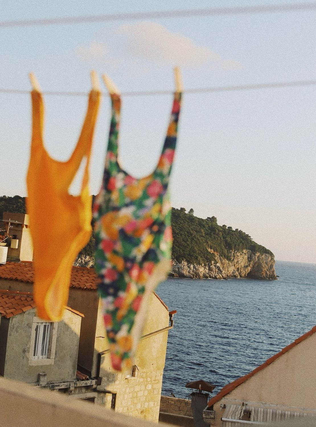 Swimsuits drying above the sea